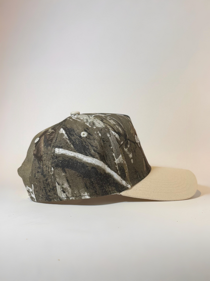 Right side view of hat with the cat showing camo canvas
