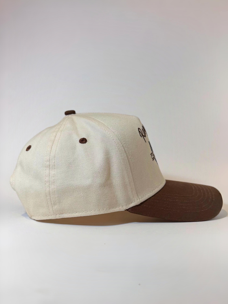 Side view of Highwayman Hat with cream coloured canvas