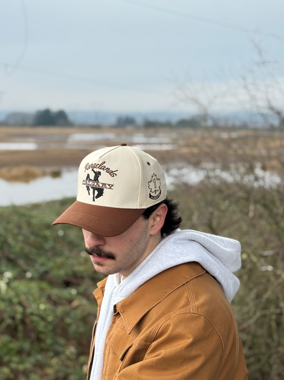Highwayman Hat worn in a ranch setting