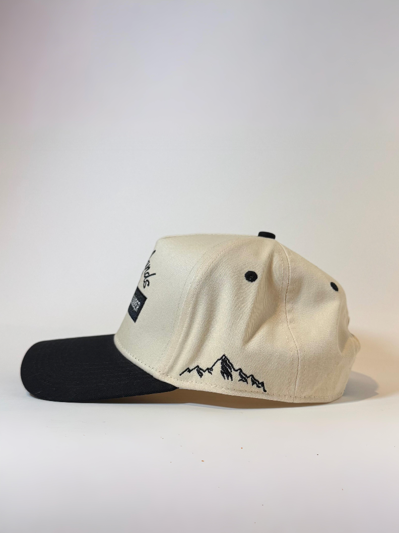Side view of lumberjack hat with mountain logo