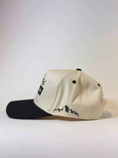 Side view of lumberjack hat with mountain logo
